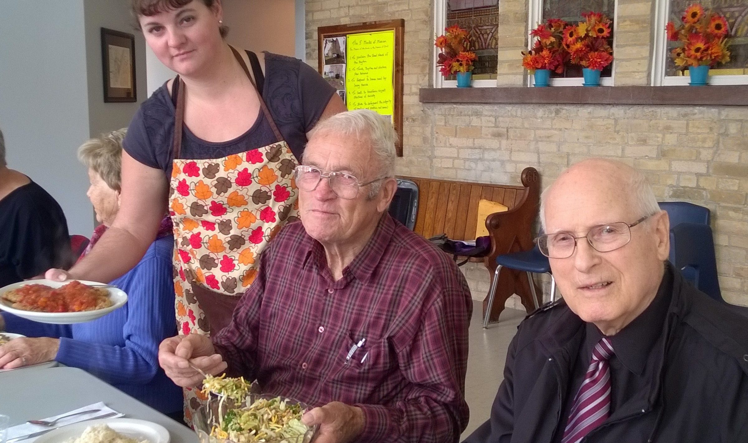 People Enjoying a meal